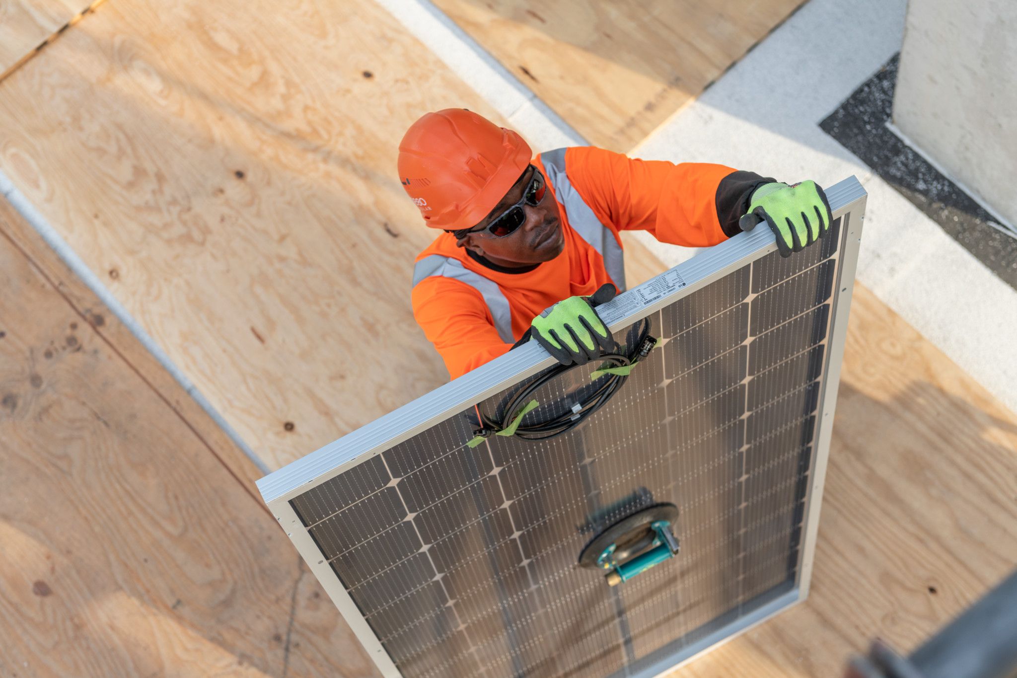 Construction worker with solar panel