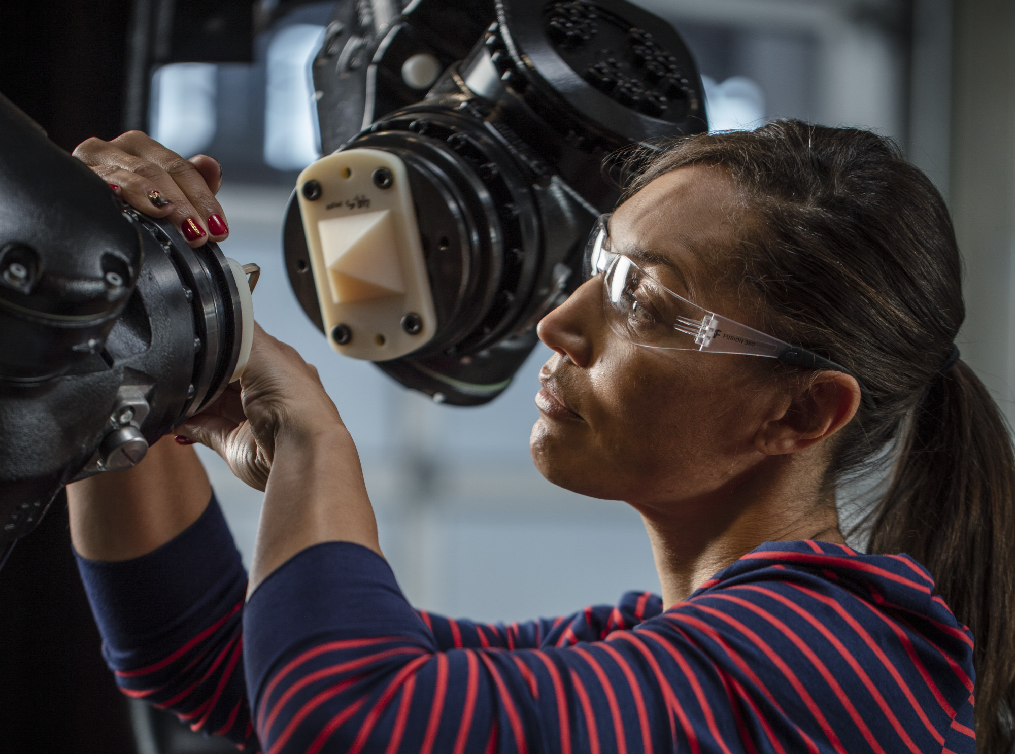 Woman working with a robot