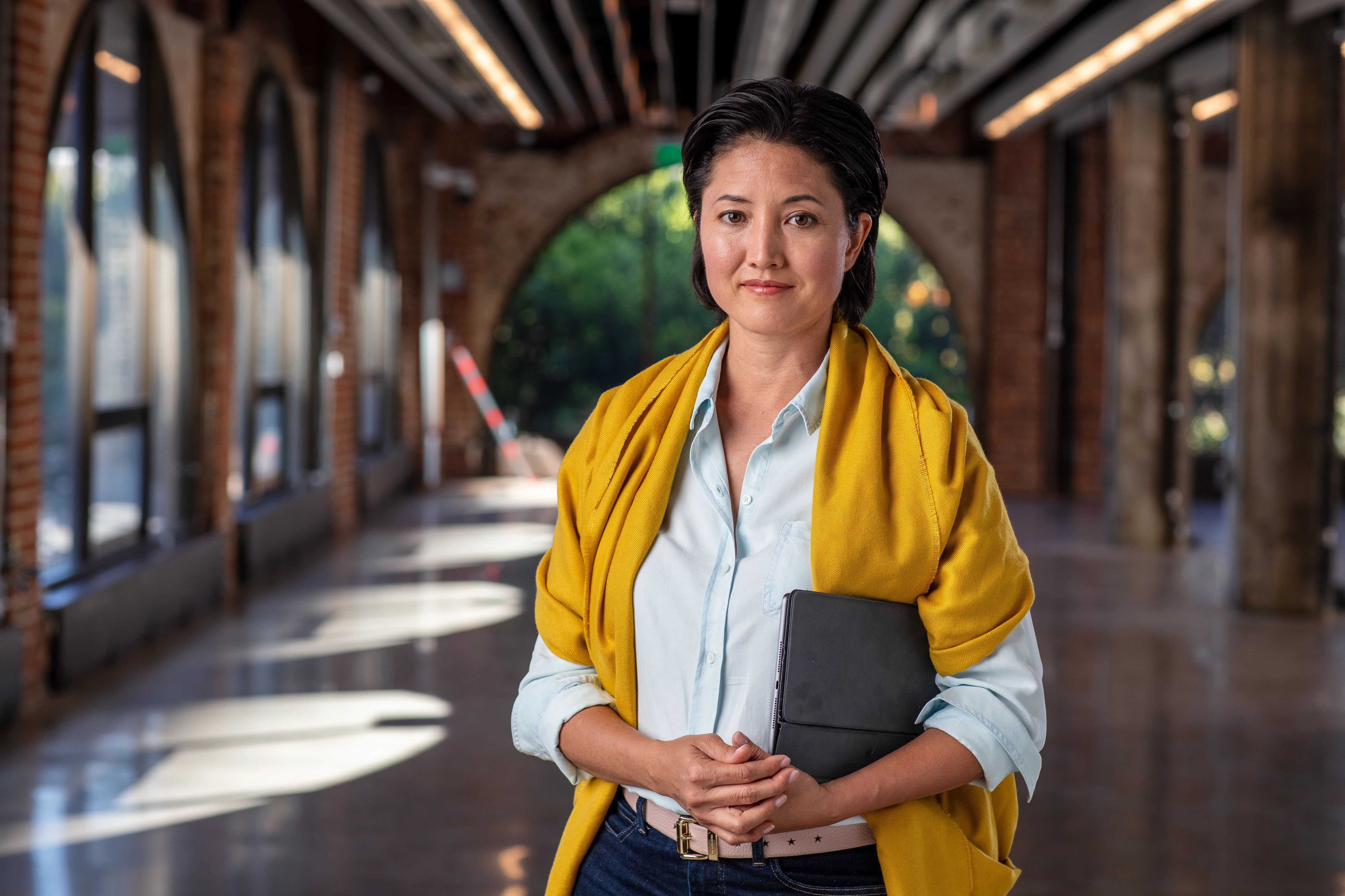 Woman standing with iPad