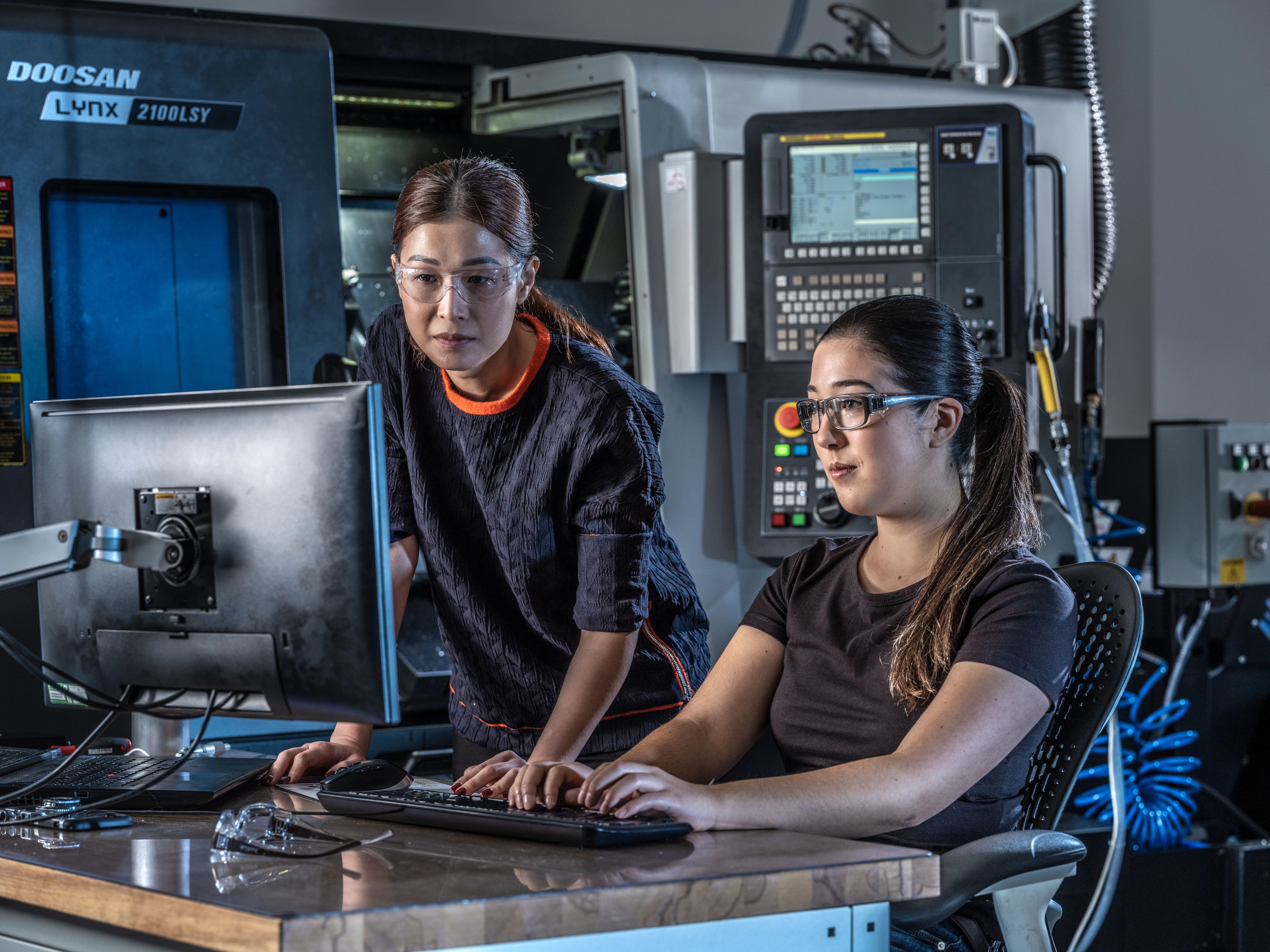 Two women working