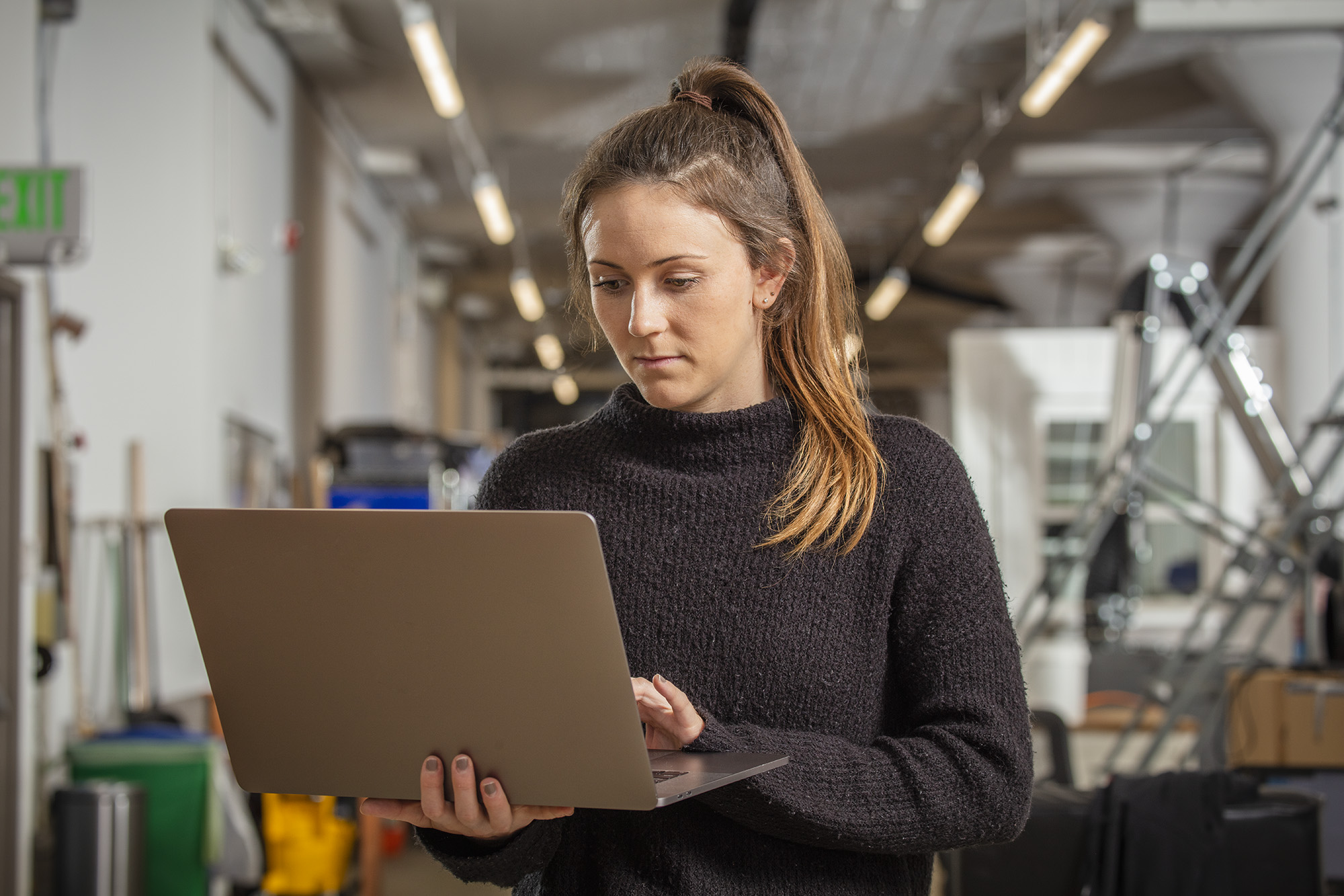 Woman reading on laptop