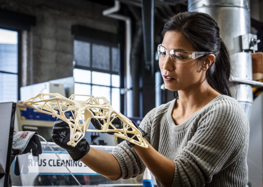 woman-holding-generative-design-ai-part-autodesk