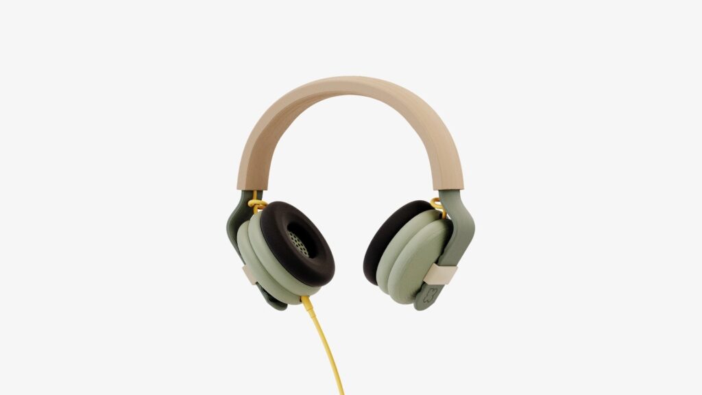 Green and tan Batch.Works Kibu headphones on white background.