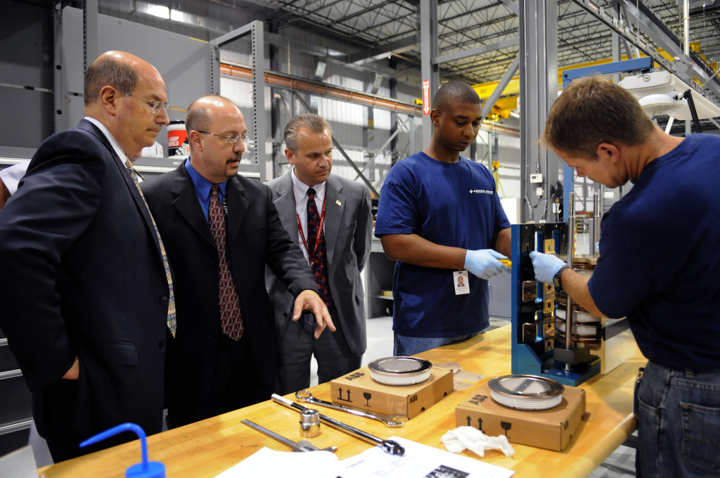 080729-N-5549O-101 TUPELO, Miss. (July 29, 2008) Secretary of the Navy (SECNAV) The Honorable Dr. Donald C. Winter receives a tour of General Atomics Electromagnetic Aircraft Launch System (EMALS) manufacturing plant. EMALS is the next generation of aircraft catapult systems that will be installed on the newest class nuclear aircraft carrier USS Gerald R. Ford (CVN 78) (U.S. Navy photo by Mass Communication Specialist 2nd Class Kevin S. O'Brien/Released)